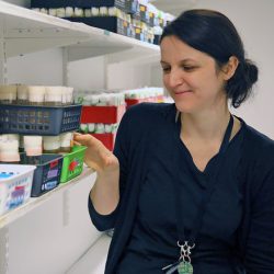 A picture of Petra Tauscher at a lab bench